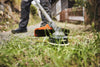 Vista completa del Kombi Stihl KM 131 R in ambiente giardino